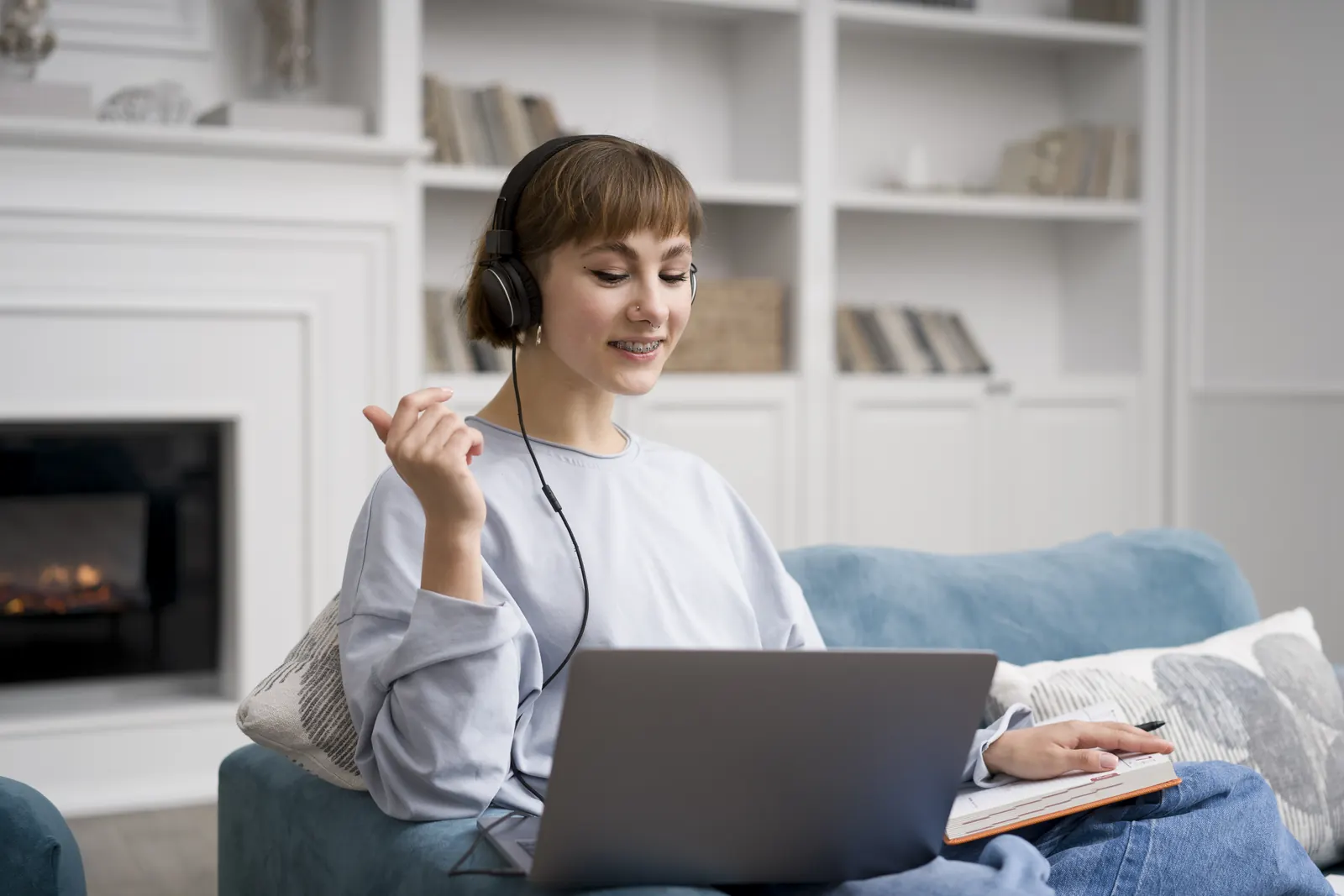 A student comparing the cost of online BSW programs on a laptop